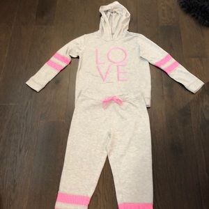 gray and pink tracksuit